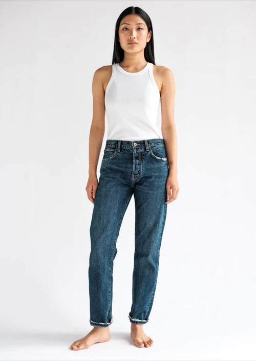 Elevate your denim collection with Boro Denim's Tokyo jeans, a contemporary reimagining of the Levi's 501 big E. This design boasts a mid-rise, seamlessly transitioning into a straight-leg silhouette. Expertly tailored, it offers a snug fit around the hips and thighs, flowing straight through to the ankles.