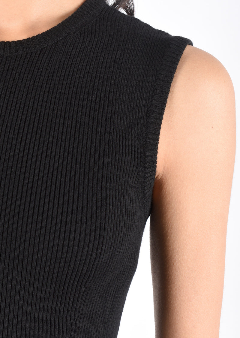 Lars Andersson's 2x1 Peplum tank is made from 100% Superfine Merino Wool with a beautiful ribbed texture - available in classic black. Easy to layer - perfect top for putting under your favorite blazer. This top offers the perfect balance of weight with a fitted top and peplum waist. Lars Andersson 2x1 Peplum Tank in Black Merino Wool