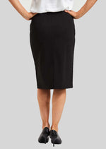 Sophisticated Pencil Skirt in Black. A simplistic pencil skirt with an impeccable fit. Fashioned in sophisticated Paramount Knit for ultimate comfort, this style forms to the body, hugging curves and providing plenty of give. The knee length hemline is classic and modest.