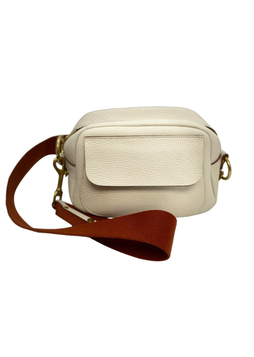 Valerie Salacroux 's Nicky Bag is going to be your new favorite!&nbsp;Made from luxurious bull-calf leather and handcrafted in Paris, France, this masterpiece exudes sophistication.  Featuring a chic cream tone complemented by brown leather accents and gold hardware, it's timeless and elegant.&nbsp;  With an outer pocket and removable strap, it's as practical as it is luxurious. Perfect for day or night, this bag is sure to make a fabulous statement wherever you go!&nbsp;