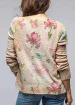 Avant Toi Floral V-Neck Sweater in Burro. This hand painted sweater is soft to the touch and super cozy. Experience luxury and comfort like never before with this hand painted sweater. Its soft, cozy fabric will make you feel like you're being hugged by a cloud. You won't want to take it off!