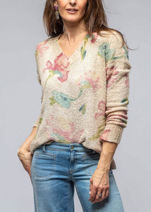 Avant Toi Floral V-Neck Sweater in Burro. This hand painted sweater is soft to the touch and super cozy. Experience luxury and comfort like never before with this hand painted sweater. Its soft, cozy fabric will make you feel like you're being hugged by a cloud. You won't want to take it off!