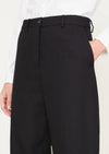 Indulge in luxurious comfort and effortless style with the Bergfabel Maria Pants in Black. Crafted from a premium linen and cotton blend, these classic trousers exude sophistication with their button fastening, belt loops and side seam pockets. The relaxed tapered leg adds a touch of elegance, making these pants a must-have for any  wardrobe.