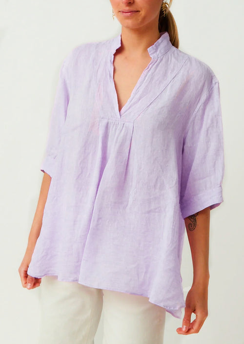 The PERFECT Spring Top! Elevate your wardrobe with the Bergfabel Short Sleeve Tyrol Shirt in Lavendar. Crafted from crisp cotton, this women's button down features a pleated front and V-Neck. Perfect for adding a touch of sophistication to any outfit.