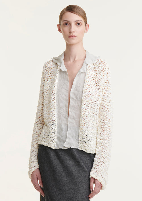 This loose weave cardigan features tons of fabulous details. From it's stained glass  woven appearance to the the fabulous drape, hand woven texture, and linen lapels - we just know this is going to be your new Spring go-to! Admire the intricate stained glass-inspired weave and luxuriate in the delicious drape and hand woven texture.