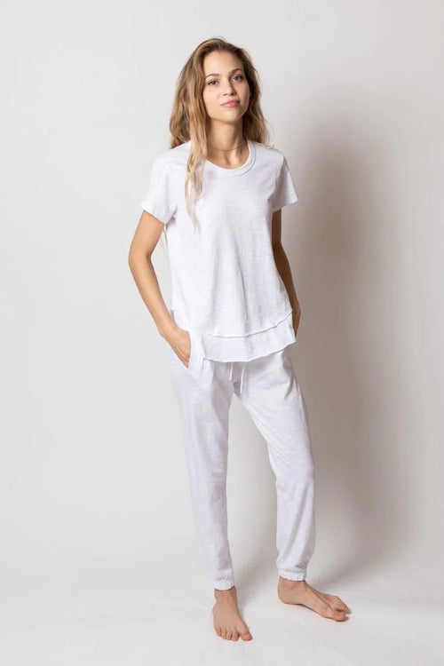 Leallo Daisy Ruffle Bottom Tee in White