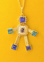 Introducing the Van Robots Denim pendant. Crafted with articulated movement, this pendant features hand-set gold, diamonds, sapphires, blue kyanite, blue topaz, and tanzanite stones. 