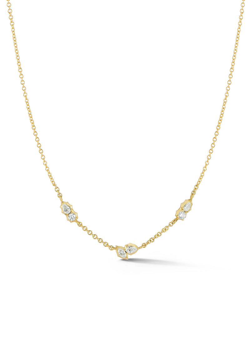 The Posey Station Necklace is a delicate and dainty piece that can be easily paired with any neck-stack. Handcrafted in 18-karat gold and featuring round, pear, and marquise-shaped diamonds.   Handcrafted in 18-Karat Gold 0.39 total carat weight 18-Inch Cable Chain with Adjustable clasp Made in New York City