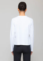 Leset Margo Long Sleeve in White. The Margo Long Sleeve is a classic crewneck long sleeve t-shirt that strikes the perfect balance between a tailored and relaxed silhouette. The classic crewneck design exudes sophistication and elegance, while the tailored yet relaxed silhouette ensures ultimate comfort. From day to night, this t-shirt strikes the perfect balance between style and relaxation.