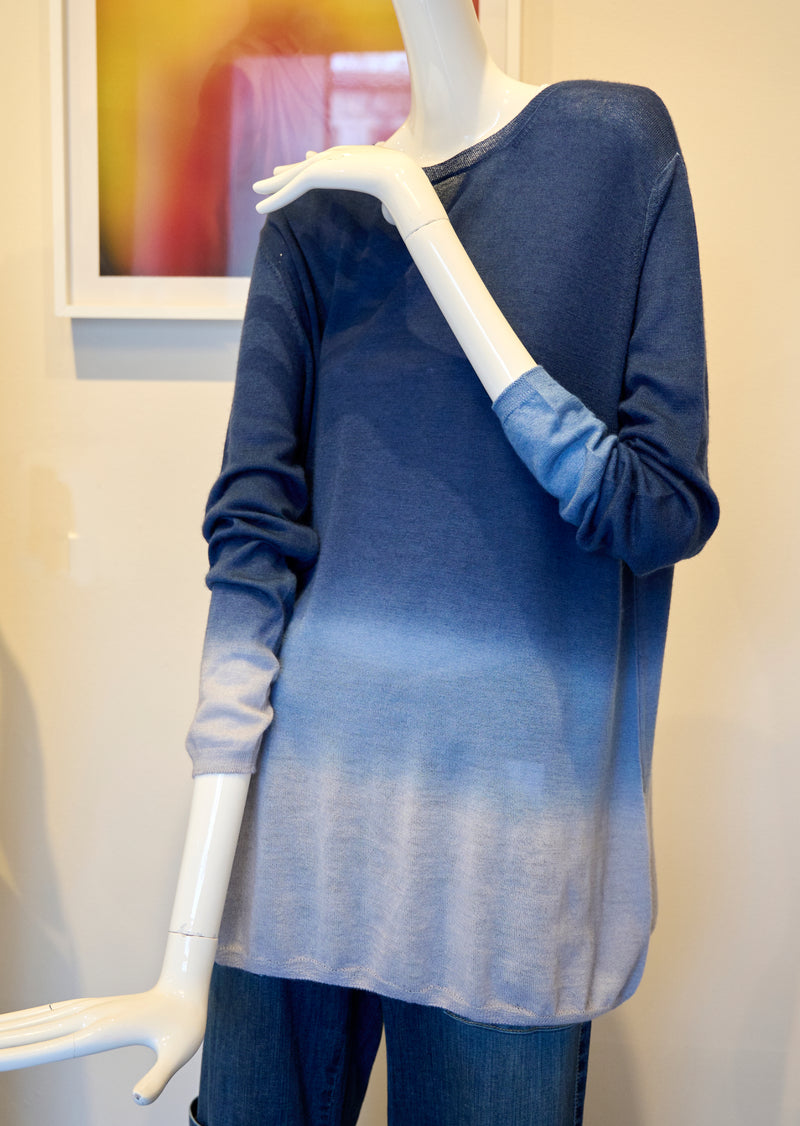 Experience the unparalleled luxury of our Mirror in the Sky Cashmere Sweater! Handmade to perfection, this cashmere sweater boasts a sophisticated bateau neck and sensational ocean and navy dip dye. Mirror in the Sky Bateau Neck Dip Dye Cashmere Sweater in Blue