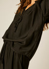 Natalie Martin Penny Blouse in Black. Classic flowy silk blouse with voluminous sleeves and button closure at wrist.