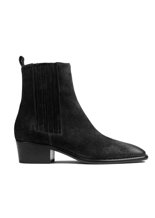 Elevate your footwear collection with the Sartore Sensory Boot in black, the perfect addition to your wardrobe. This classic Chelsea-style black suede boot is the epitome of timeless style and allows for a multitude of fashion possibilities. Step out in bold confidence with these stylish and comfortable boots!