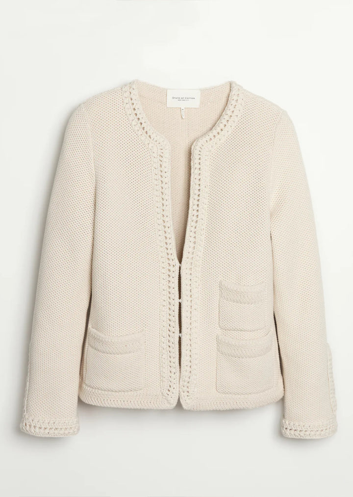 Constructed from luxurious Turkish cotton, The Merion sweater boasts a statement-making combination of seed stitch and hand-crocheted trims, inspired by vintage designs. Perfectly pairs with your favorite bottoms.