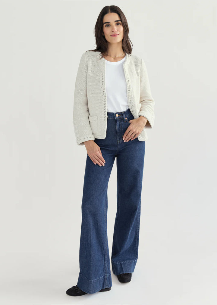 Constructed from luxurious Turkish cotton, The Merion sweater boasts a statement-making combination of seed stitch and hand-crocheted trims, inspired by vintage designs. Perfectly pairs with your favorite bottoms.