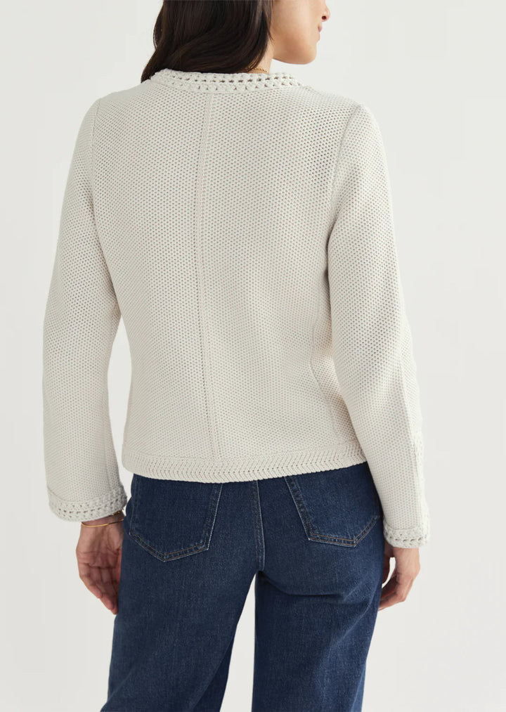 Constructed from luxurious Turkish cotton, The Merion sweater boasts a statement-making combination of seed stitch and hand-crocheted trims, inspired by vintage designs. Perfectly pairs with your favorite bottoms.