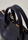 Cornelian Taurus Keyhole Mini in Black. 10" w x 7" h x 4"d Outer: 100% Cow Leather Linning: 100% Cotton Made in Japan Mini shoulder bag that can protect the contents with a flap cover. A bag with a flap cover design looks beautiful, but it takes time and effort to open the bag, which is inconvenient in terms of usability. In order to eliminate this inconvenience, a zipper is attached to the top of the bag to make opening and closing smoother and eliminate stress.