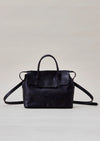 Cornelian Taurus Keyhole Mini in Black. 10" w x 7" h x 4"d Outer: 100% Cow Leather Linning: 100% Cotton Made in Japan Mini shoulder bag that can protect the contents with a flap cover. A bag with a flap cover design looks beautiful, but it takes time and effort to open the bag, which is inconvenient in terms of usability. In order to eliminate this inconvenience, a zipper is attached to the top of the bag to make opening and closing smoother and eliminate stress.