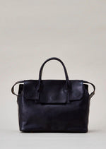 Cornelian Taurus Keyhole Mini in Black. 10" w x 7" h x 4"d Outer: 100% Cow Leather Linning: 100% Cotton Made in Japan Mini shoulder bag that can protect the contents with a flap cover. A bag with a flap cover design looks beautiful, but it takes time and effort to open the bag, which is inconvenient in terms of usability. In order to eliminate this inconvenience, a zipper is attached to the top of the bag to make opening and closing smoother and eliminate stress.