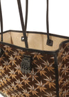 Desmalter Griffon Medium Tote Bag - Handpainted. The Lion’s Paw strap crosses from the traditional Desmalter armchairs which featured a winged lion and seven pointed star, all political and religious symbols, featured in their collection. This is sure to be your go to bag - their structured leather tote is lined in a pop of green.