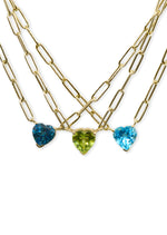 These beautiful 14kt yellow gold necklace will make a stunning addition to your necklace collection. With sparkling topaz hearts these necklaces will be a welcome addition to your spring wardrobe.  16" long 14kt yellow gold chain 1/4" long pendant from top to bottom Made in NYC